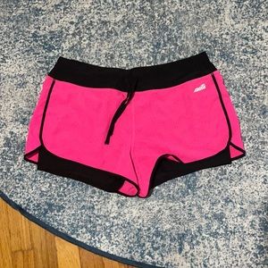 Pink and black runner shorts